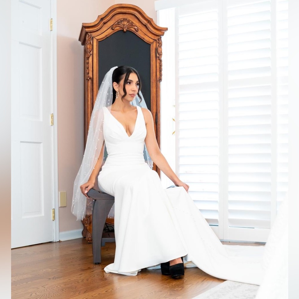Wedding dress! Paid $1600 for it. Worn 30 min at modern Italian style wedding.
